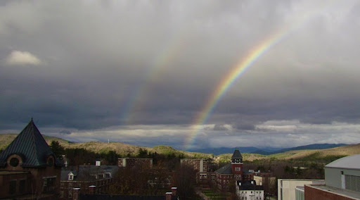 The primary rainbow is the brightest of the bows and the feature that is always present. A fainter and broader secondary rainbow with inverted colors is sometimes visible about eight degrees above. The darker area between the two is Alexander’s dark band. This picture was taken from the roof of the Plymouth State University science building, looking toward the school’s iconic Rounds Hall clock tower. Photo credit: Lourdes Avilés
