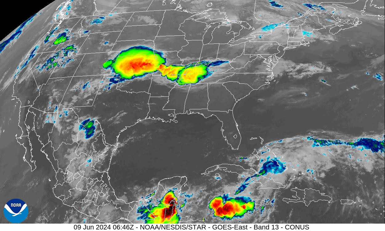 This MCS was very recognizable on satellite and radar.  The enormous cold cloud shield can be seen on this 10.3-micron IR image.  The yellow and red areas represent temperatures less than -59°C.  This image was taken at 0646 UTC 09 June. 