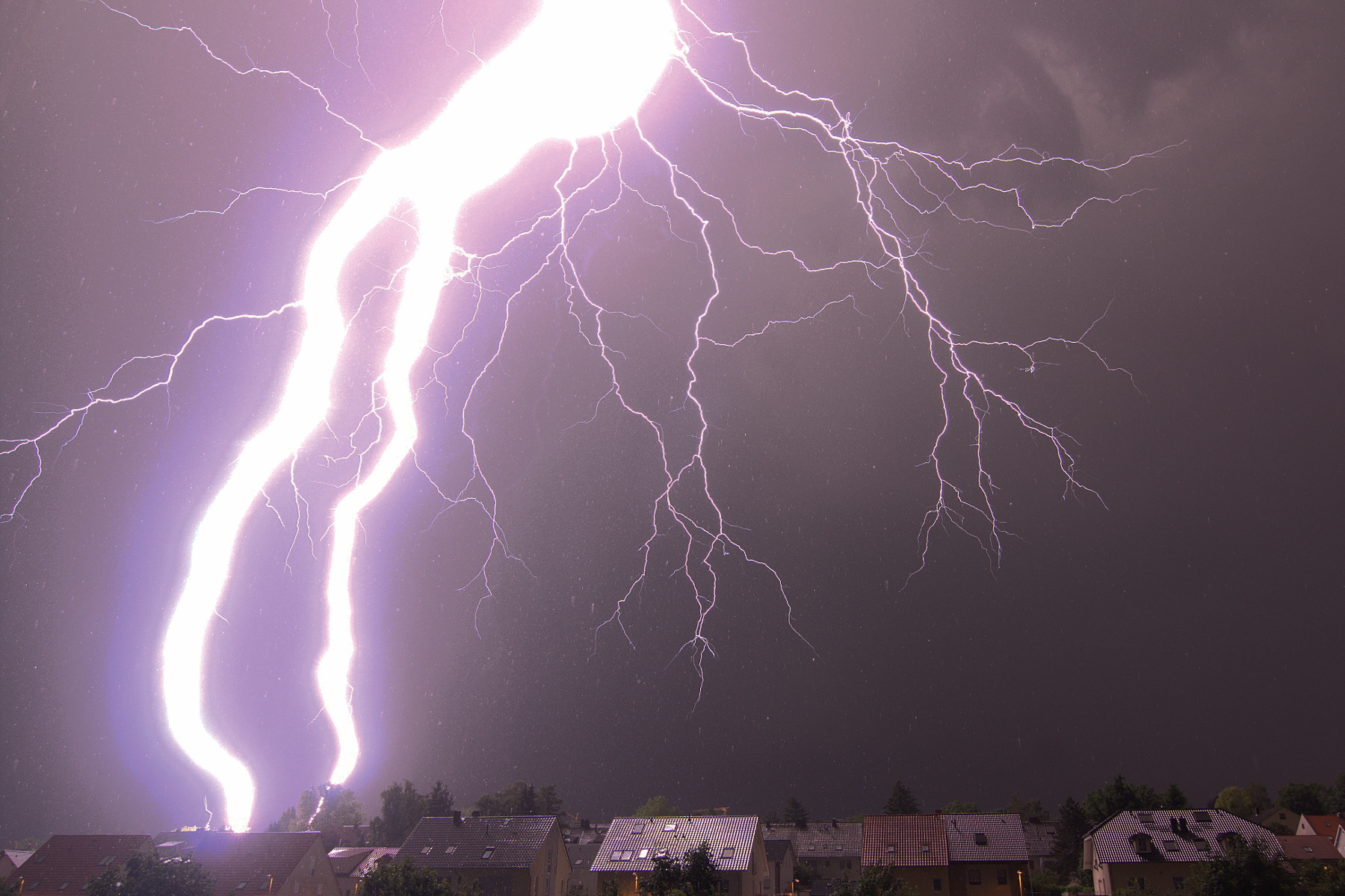 Very close lightning strike observed during a thunderstorm in Mainz, Germany.  [Photo Credit: Oliver Schlenczek (distributed via imaggeo.egu.eu)]